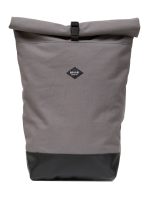 The Rolltop Canvas Braasi backpack in light grey with a black leather bottom