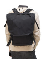 A model wearing the Braasi Klopista in black, made with water resistant lining and durable Cordura.