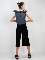 A girl wearing the grey Braasi basic model made from Cordura