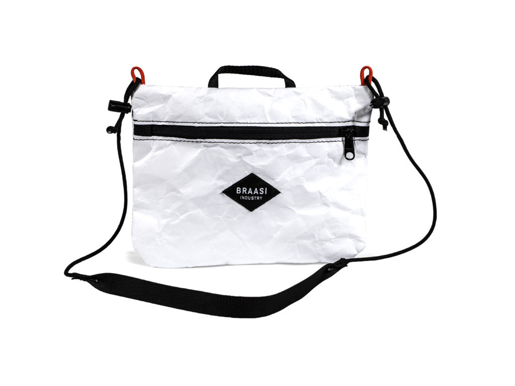 A white Sacoche Braasi bag made out of Tyvek
