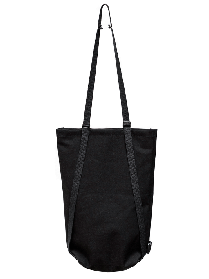The backside of Braasis black Canvas Bag that can function as a backpack and a bag
