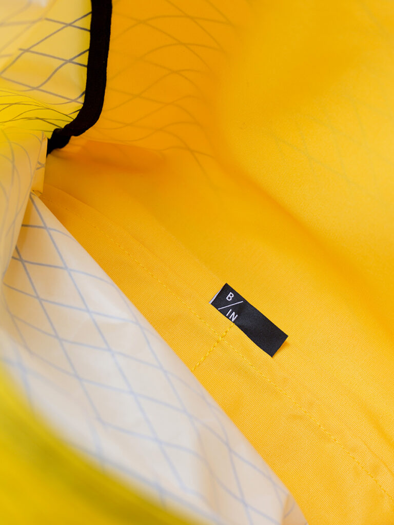 Vnitřní kapsy žlutého batohu Wicker X-Pac od Braasi